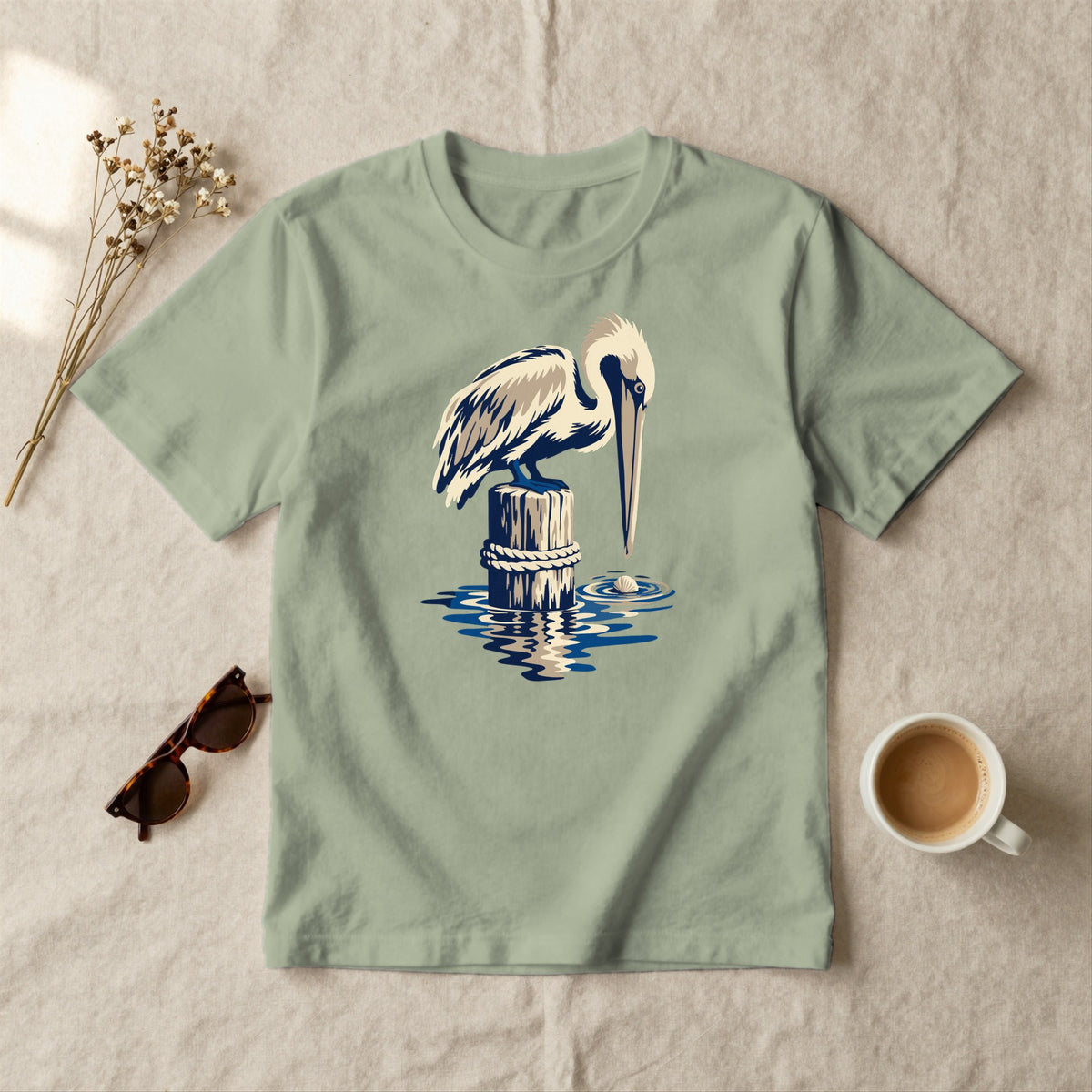 Pelican on a Piling - styled flat lay · sage